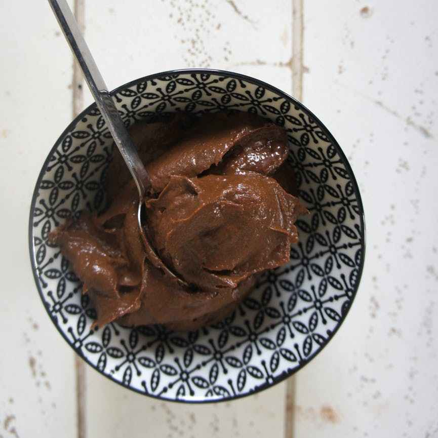 bowl of chocolate spread with spoon